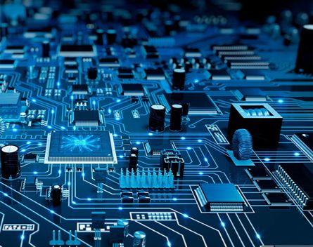 A close up of some electronic components on a circuit board